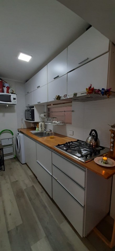 Departamento 2 ambientes con patio y cochera